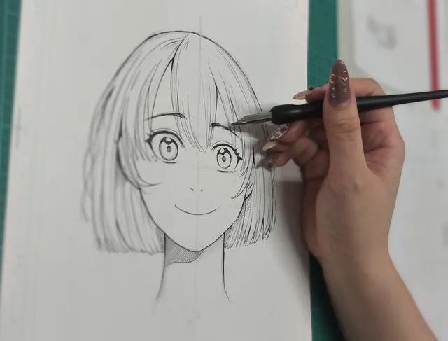 Manga workshop instructor drawing