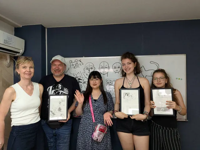 Family and friends proudly holding their framed manga artwork