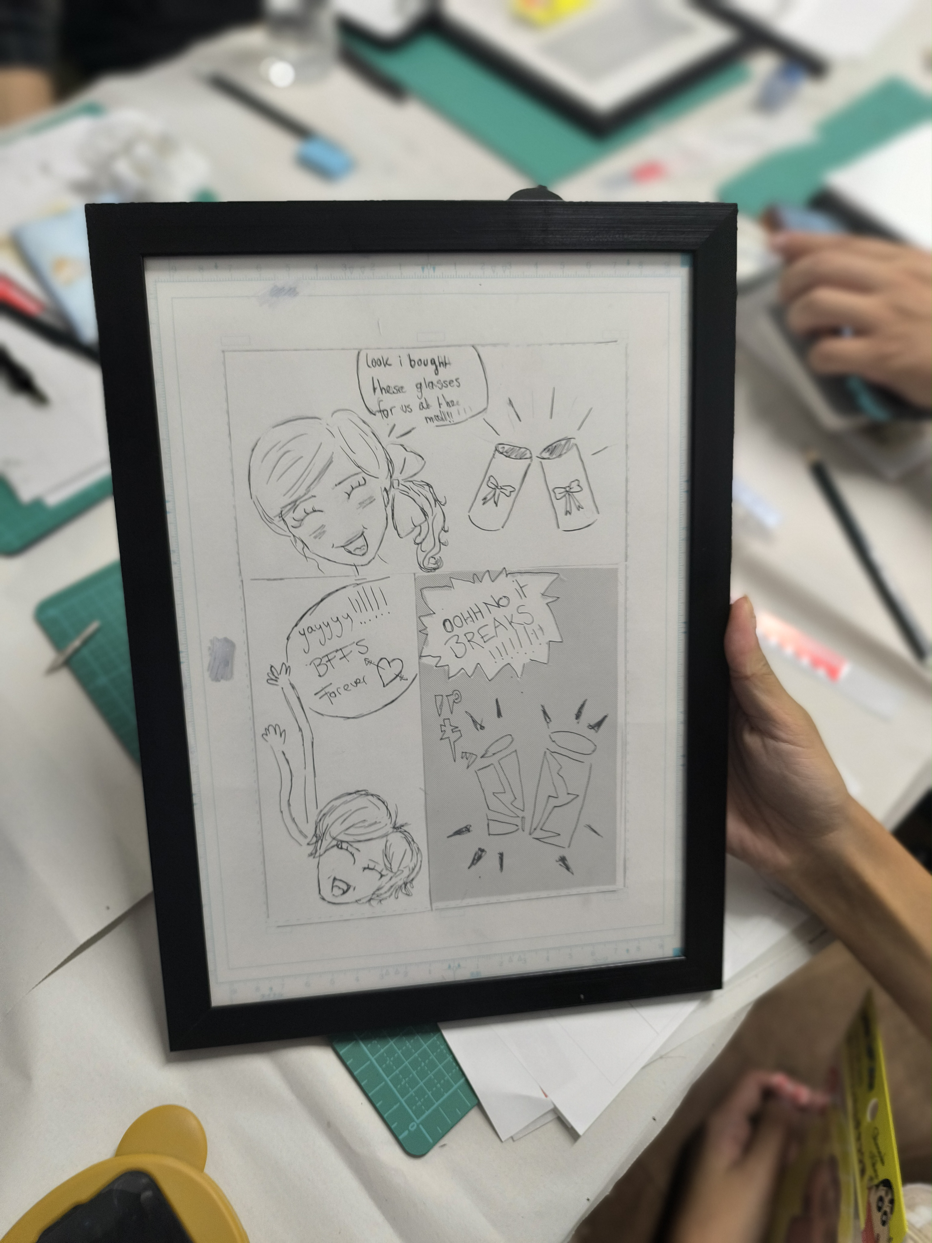 Workshop table with professional manga tools