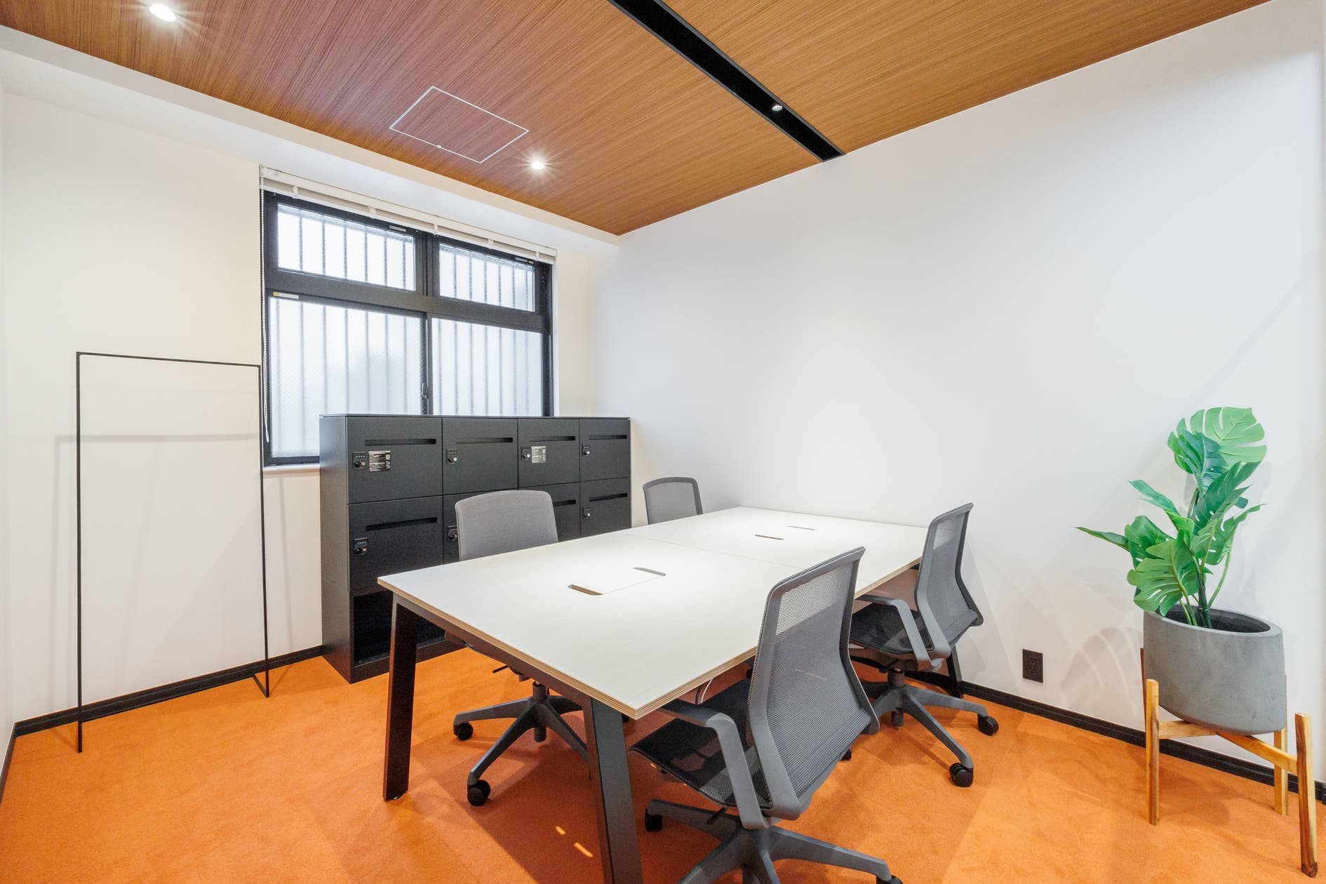 Workshop room with monitor and whiteboard